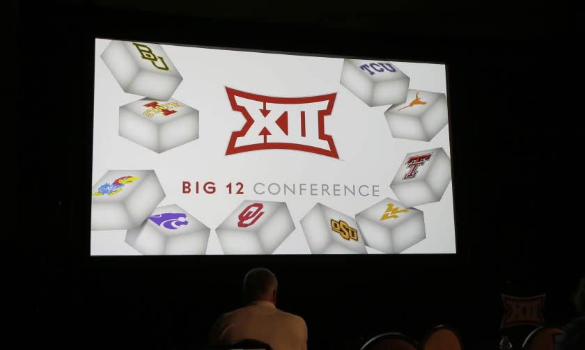 The Big 12 logo is shown during the Big 12 college football media days in Dallas, Tuesday, July 19, 2016. (AP Photo/LM Otero)