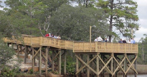 The Crooked Creek fishing pier is handicapped accessible and zigzags into brackish water where you can use a freshwater or saltwater license to fish.