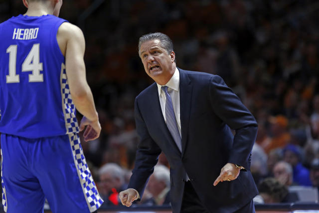 Kentucky head coach John Calipari talks to Tyler Herro during the first half of an NCAA college basketball game against Tennessee Saturday, March 2, 2019, in Knoxville, Tenn. (AP Photo/Wade Payne)
