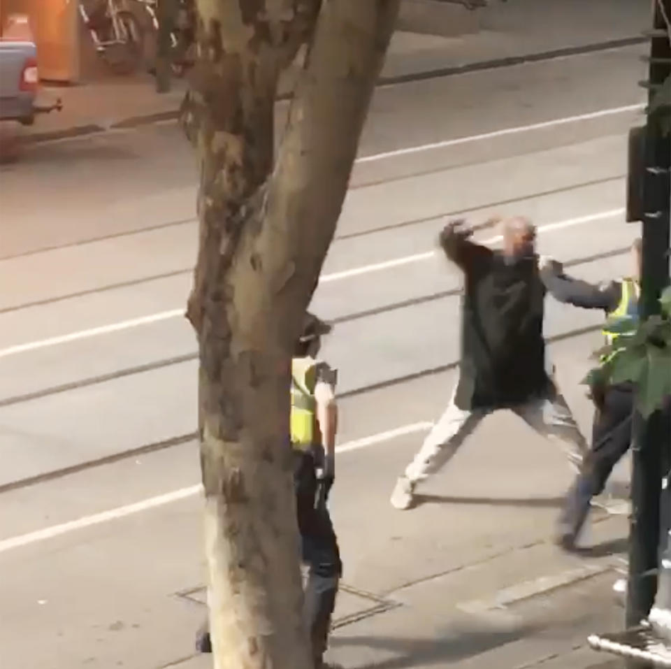 A screenshot taken from a supplied video showing an incident on Bourke Street in Melbourne on Friday, November 9. Source: AAP Image