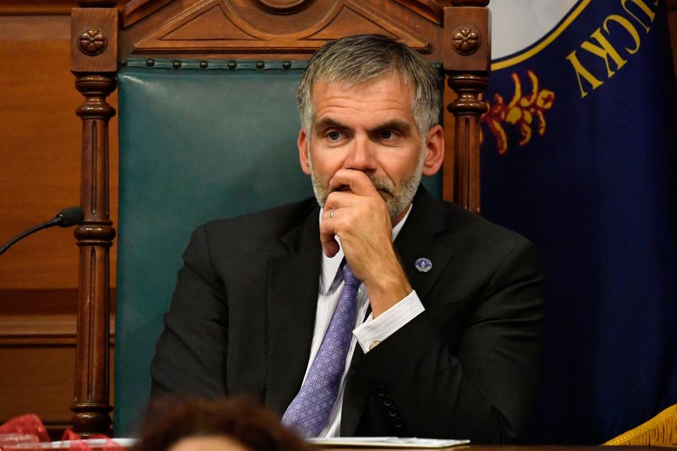 Louisville Metro Council President Markus Winkler looks on as the charging documents of possible ethics violations of District 19 Representative Anthony Piagentini are read into the record during the Metro council meeting in the Louisville Metro Council chambers, Thursday, Nov. 30 2023 in Louisville Ky.