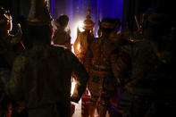 Dancers wait backstage during a performance of masked theatre known as Khon which was recently listed by UNESCO, the United Nations' cultural agency, as an intangible cultural heritage, along with neighbouring Cambodia's version of the dance, known as Lakhon Khol at the Thailand Cultural Centre in Bangkok, Thailand November 7, 2018. REUTERS/Jorge Silva