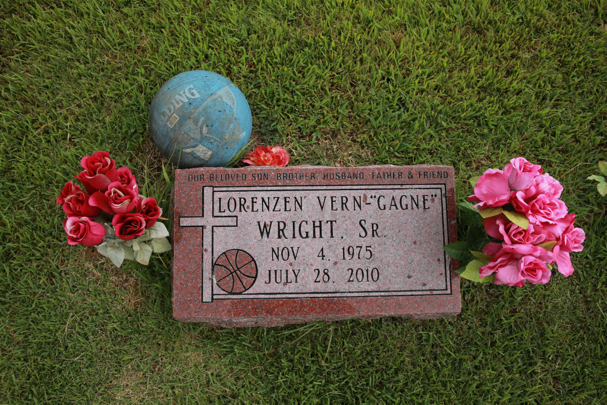 Closeup of gravestone of former NBA player Lorenzen Wright who played 15 seasons in the NBA. Wright was murdered in July of 2010. - Credit: Joe Murphy /Sports Illustrated via Getty Images/Getty Images