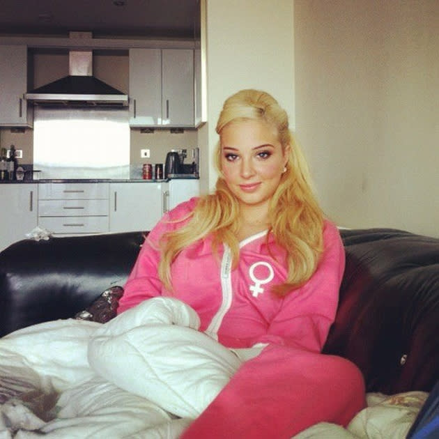 Celebrity photos: Tulisa tweeted this snap of hersef wearing a bright pink tracksuit. She told her followers that her friend had told her she looked like a ‘council estate Barbie’ in the get up.