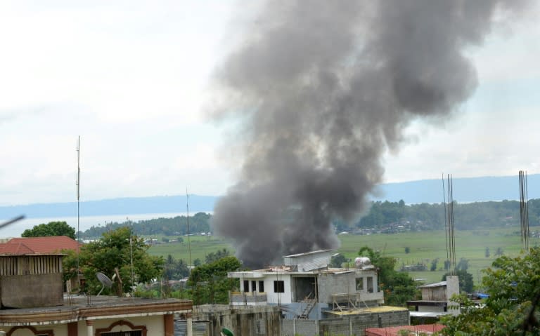 Foreigners are among Islamist gunmen battling security forces in a southern Philippine city, the government said Friday as the reported death toll from four days of clashes climbed to 46