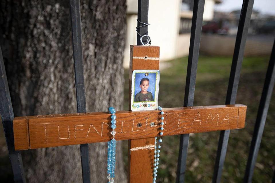 A memorial marks the spot at Spring and 34th streets in Paso Robles where a 17-year-old died in a high-speed crash on Thursday, Jan. 13, 2022.