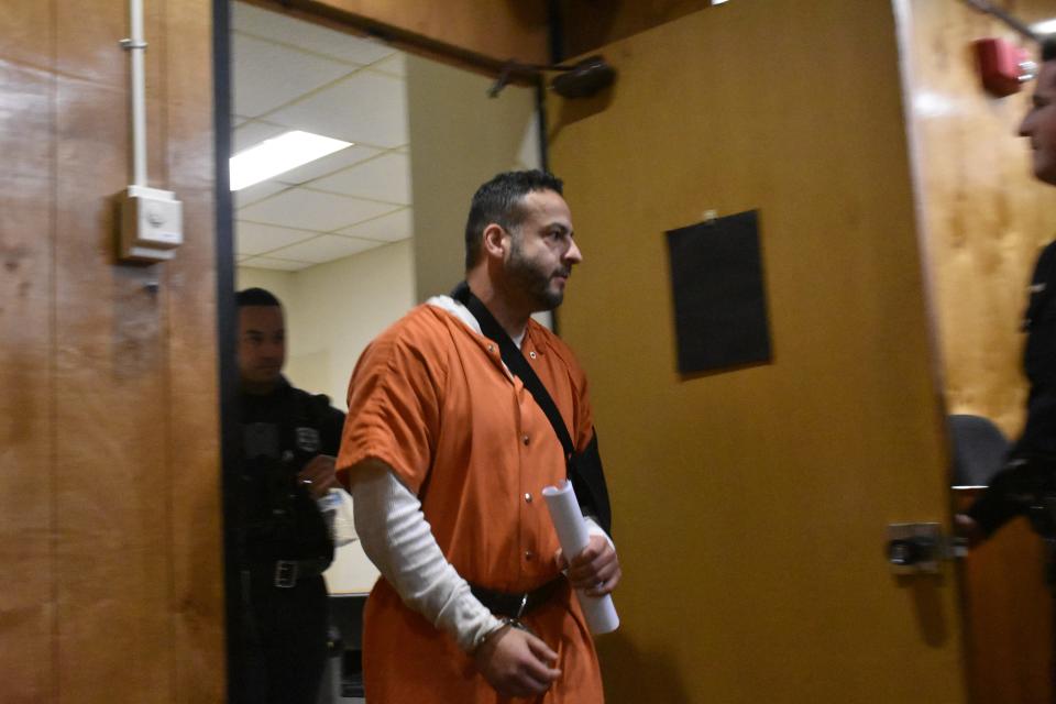 NYPD officer Hariton Marachilian appears in court and was remanded without bail at the Passaic County Courthouse in Paterson, New Jersey on Dec. 15, 2023.