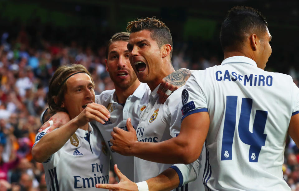 Cristiano Ronaldo and his Real Madrid teammates celebrate during the 2016-17 Champions League semifinal against Atletico Madrid. Can they win a third-straight title in 2018?