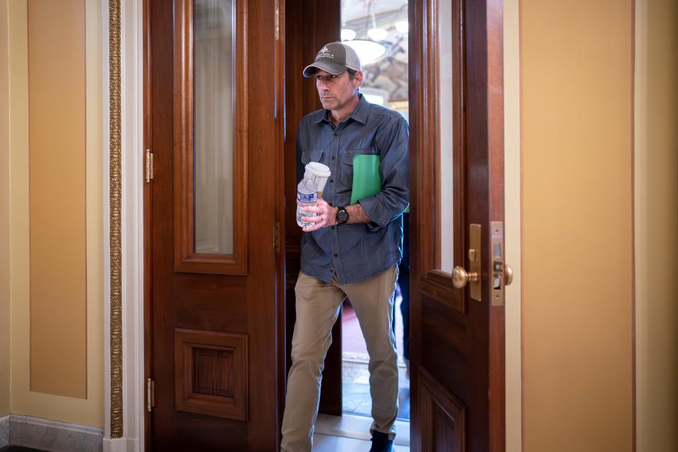 Rep. Garret Graves, R-La., top mediator in the debt limit talks for House Speaker Kevin McCarthy, R-Calif., leaves a meeting room after negotiations came to an abrupt halt, at the Capitol in Washington, Friday, May 19, 2023. Graves told reporters it's time to "press pause" and it's "just not productive" to continue at this point.