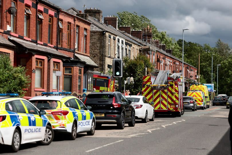 A number of homes have been evacuated on Lees Road and Kelverlow Road in Oldham