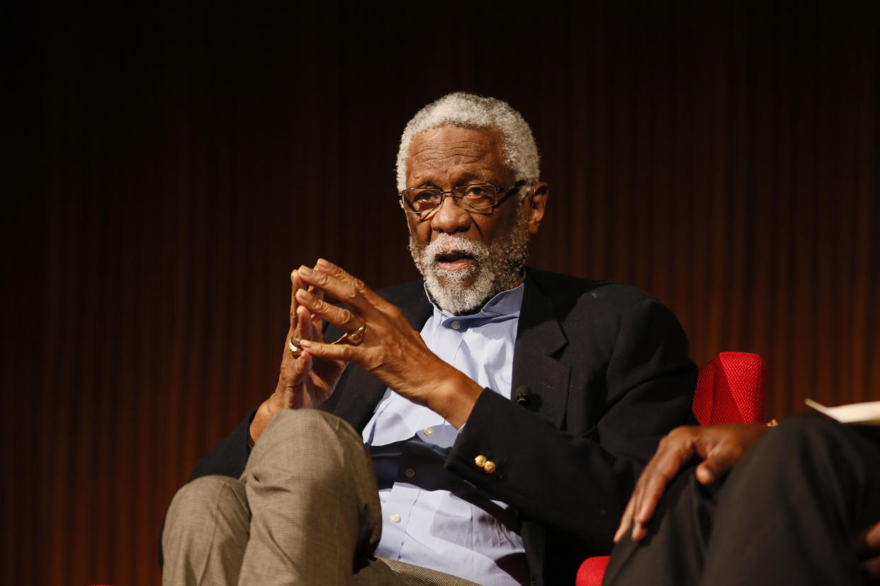 FILE - In this April 9, 2014, file photo, Basketball Hall of Famer Bill Russell takes part in the "Sports and Race: Leveling the Playing Field" panel during the Civil Rights Summit in Austin, Texas. Russell has been released from a Seattle hospital after an overnight stay for an unknown condition. Russell confirmed on Twitter Saturday, May 19, 2018,  that he went to the hospital late Friday but does not say why. (AP Photo/Jack Plunkett, File)