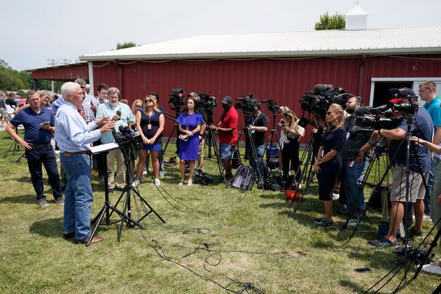 Republican presidential candidate and former Vice President Mike Pence speaks with the media during a stop at the Indiana State Fair on Wednesday in Indianapolis.