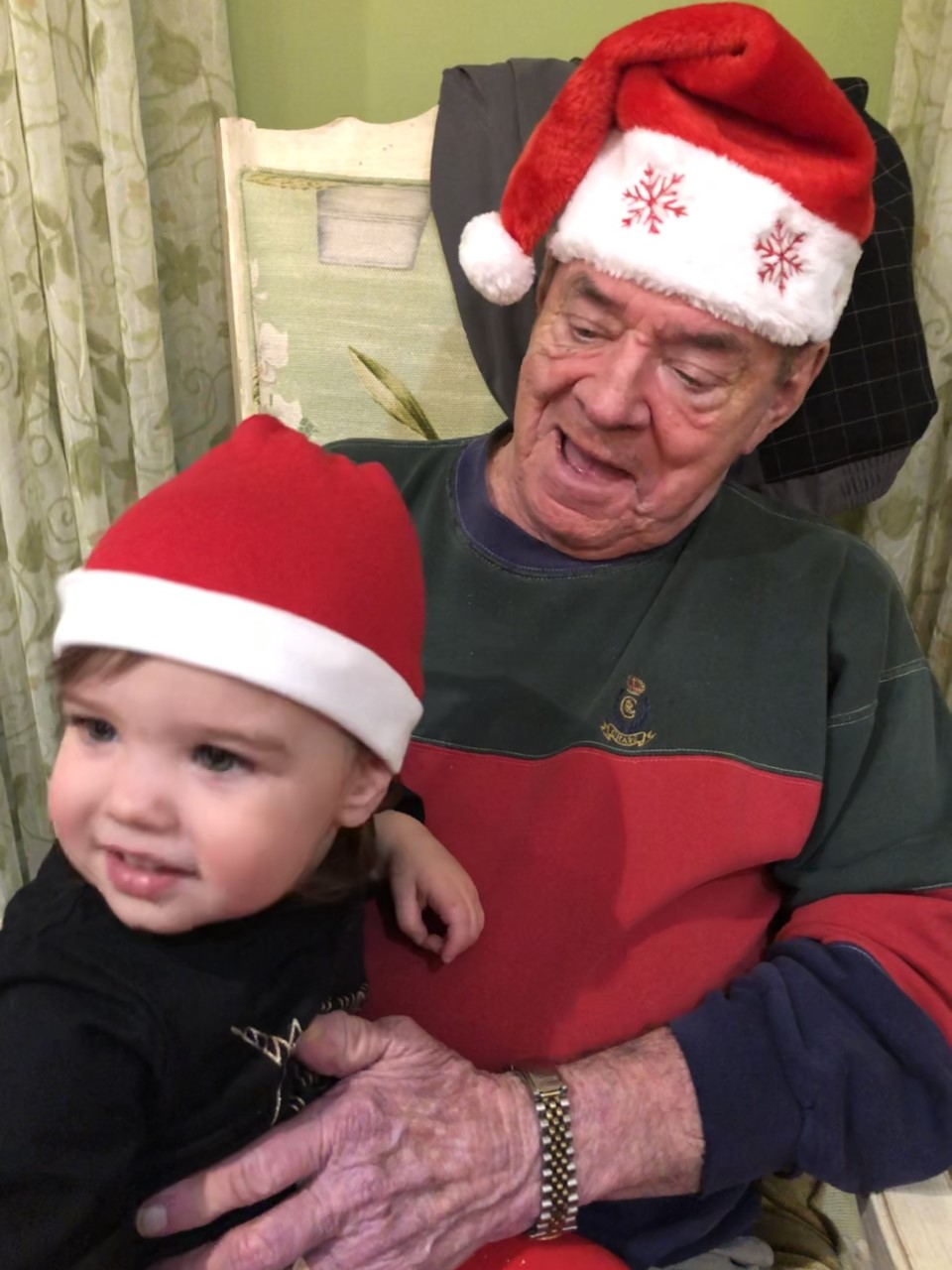 Jack Murphy celebrates a pre-COVID-19 Christmas with his great-granddaughter, Violet.