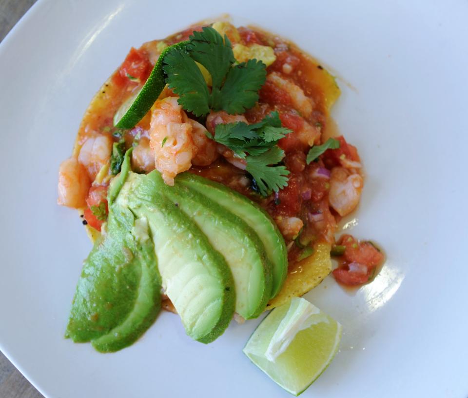 Ceviche from Jalisco restaurant is shrimp with a vegetable mixture including tomatoes, lime and avocado.