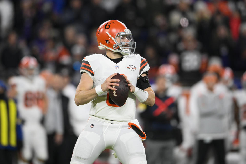 Cleveland Browns quarterback Baker Mayfield looks to pass against the Baltimore Ravens during the first half of an NFL football game, Sunday, Nov. 28, 2021, in Baltimore. (AP Photo/Nick Wass)