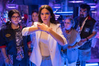 This image released by Warner Bros. Pictures shows, from left, Belissa Escobedo, Adriana Barraza, Bruna Marquezine, Elipida Carrillo and George Lopez in a scene from "Blue Beetle." (Warner Bros. Pictures via AP)