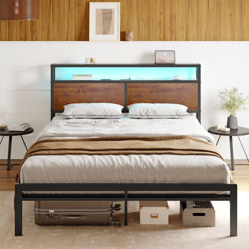 <p><a href="https://go.redirectingat.com?id=74968X1596630&url=https%3A%2F%2Fwww.wayfair.com%2F--%2Fpdp%2F17-stories--calion-bed-frame-with-led-lights-and-usb-ports-metal-frame-with-headboard-large-storage-space-sbip2107-l12-raho1096.html&sref=https%3A%2F%2F" rel="nofollow noopener" target="_blank" data-ylk="slk:Shop Now;elm:context_link;itc:0;sec:content-canvas" class="link ">Shop Now</a></p><p>Calion Bed Frame with LED Lights and USB Ports</p><p>wayfair.com</p><p>$178.99</p>