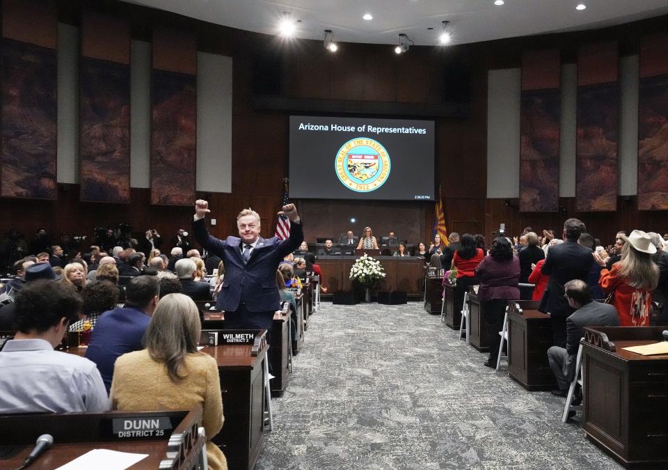 State Sen. Anthony Kern of District 27 stands, turns his back and reacts as Arizona Gov. Katie Hobbs gives her State of the State speech to start the 2024 legislative session in Phoenix on Jan. 8, 2024.