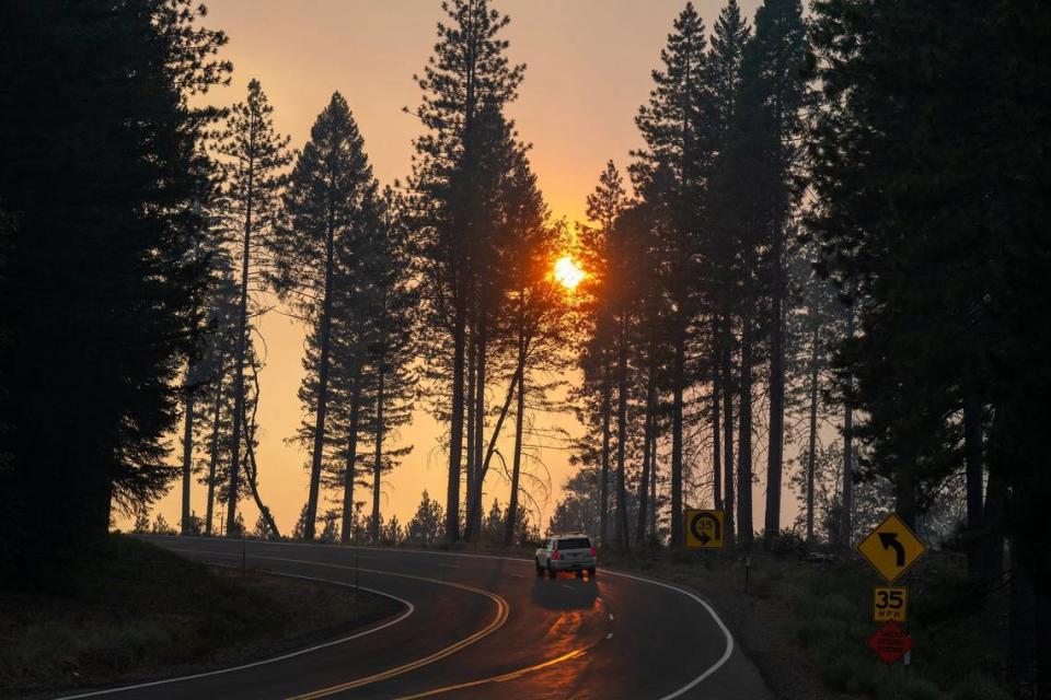 The sun shines through smoke from the Park Fire east of Chico on Highway 32 on Tuesday.
