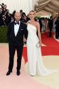 <p>Another newly engaged pair. Rosie and Jason may seem an unlikely duo but the tough guy’s tux and model’s daring looks work like a dream. <i>[Photo: Getty]</i> </p>