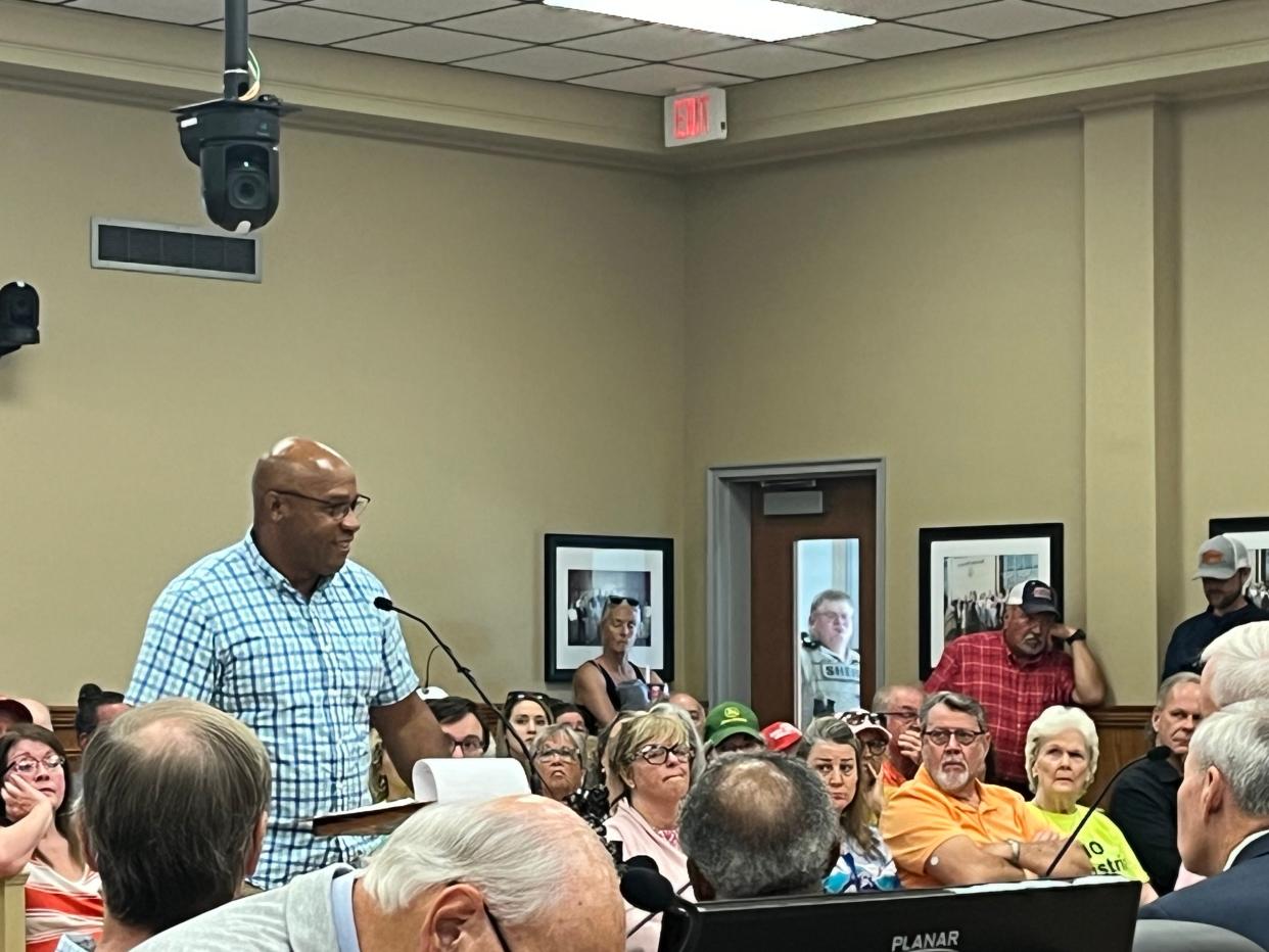 Wilson County Commissioner Chris Dowell addresses a packed crowd at a Wilson County Planning Commission meeting that debated a massive industrial park proposal by Texas base Hillwood.