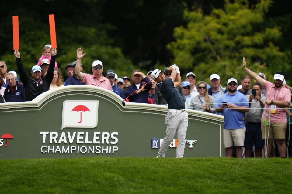Taiwan's C.T. Pan tees off on the first hole during the first round of the Travelers Championship golf tournament at TPC River Highlands, Thursday, June 22, 2023, in Cromwell, Conn. (AP Photo/Frank Franklin II)