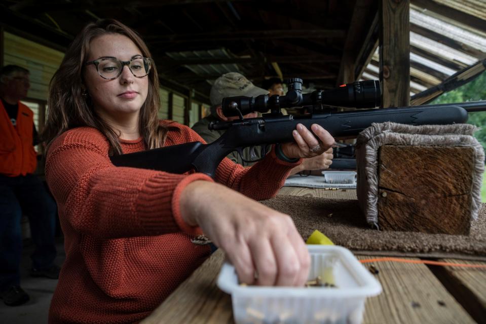 Kendra Knapp prepares to reload her rifle during a Hunter Safety Field Day at the Washtenaw Sportsman's Club in Ypsilanti on Saturday, Sept. 9, 2023.