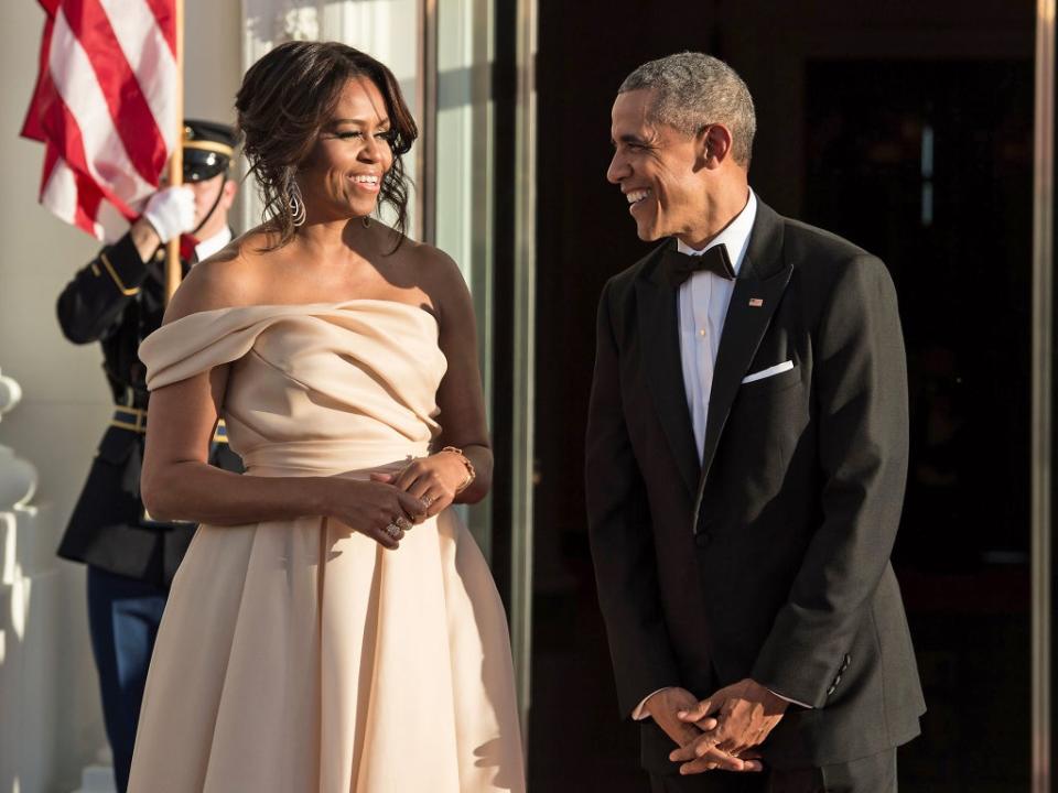 Michelle and Barack Obama wait for the leaders of five Nordic countries to arrive for a state dinner in 2016 (AFP/Getty)