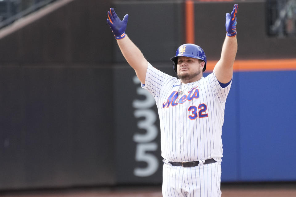 New York Mets' Daniel Vogelbach reacts after hitting an RBI double during the seventh inning of a baseball game against the Cincinnati Reds, Sunday, Sept. 17, 2023, in New York. (AP Photo/Mary Altaffer)