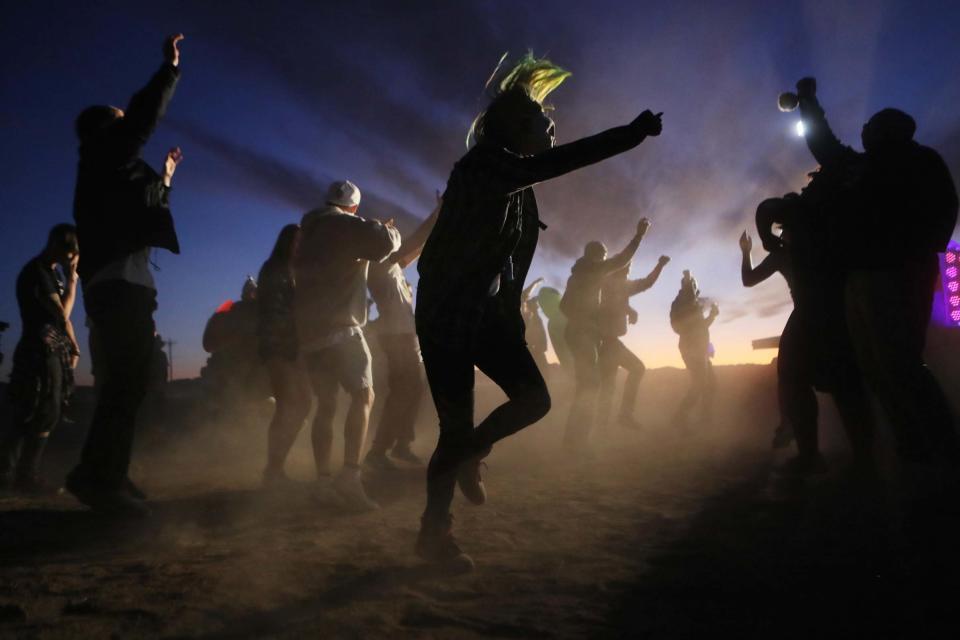 Revellers dance at the 'Storm Area 51' spinoff event 'Alienstock' after another was called off. (Getty Images)