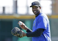 Retired NBA All-Star Tracy McGrady throws a pitch at the Sugar Land Skeeters baseball stadium Wednesday, Feb. 12, 2014, in Sugar Land, Texas. McGrady hopes to try out as a pitcher for the independent Atlantic League Skeeters. (AP Photo/Pat Sullivan)