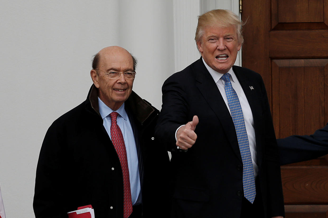 Donald Trump and greets Wilbur Ross for a meeting at Trump National Golf Club in Bedminster, New Jersey, U.S., November 20, 2016. REUTERS/Mike Segar