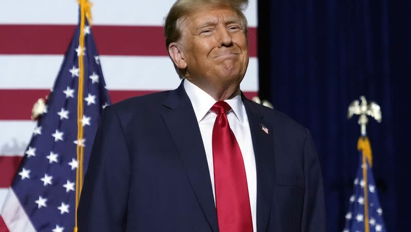 Republican presidential candidate former President Donald Trump arrives to speaks at a caucus night party in Des Moines, Iowa, Monday, Jan. 15, 2024.