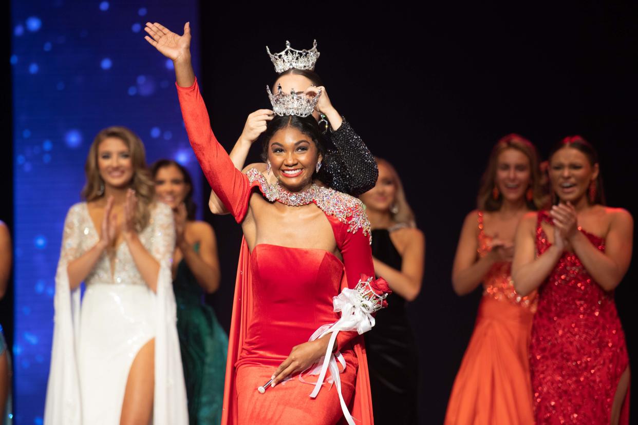 Paige Clark places the crown on Miss Lane College Jada Brown as she is crowned the new Miss Tennessee Volunteer during the final night of the 2023 Miss Tennessee Volunteer pageant competition inside Carl Perkins Civic Center in Jackson, Tenn. on Saturday, July 29, 2023.