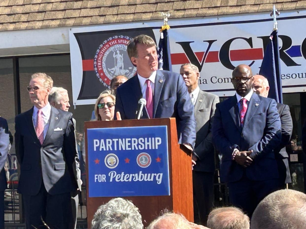 Gov. Glenn Youngkin addresses a gathering Tuesday, April 11, 2023 in downtown Petersburg. It was the governor's latest visit to Petersburg to promote one of the 42 pillars in the 'Partnership for Petersburg' initiative. This time, Youngkin was in town to announce winners of the Founders Fund grants and a new mixed-use development for the former Southside Regional Medical Center site that will be anchored by a grocery store. He also helped cut the ribbon on the new Virginia Community Resource Center.