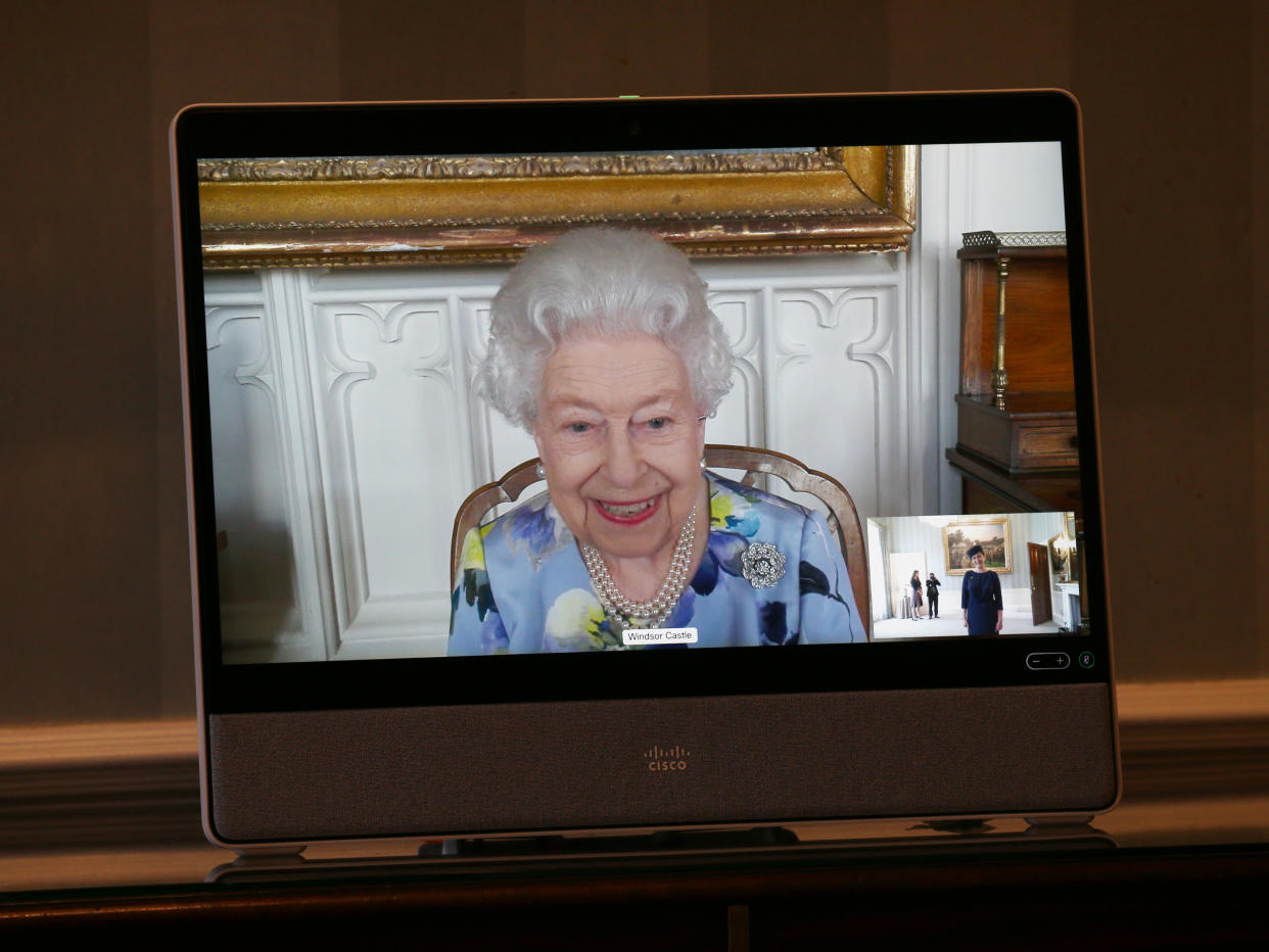 Queen Elizabeth II appears on a screen by videolink from Windsor Castle, where she is in residence, during a virtual audience to receive Her Excellency Ivita Burmistre, the Ambassador of Latvia, at Buckingham Palace, London. Picture date: Tuesday April 27, 2021.