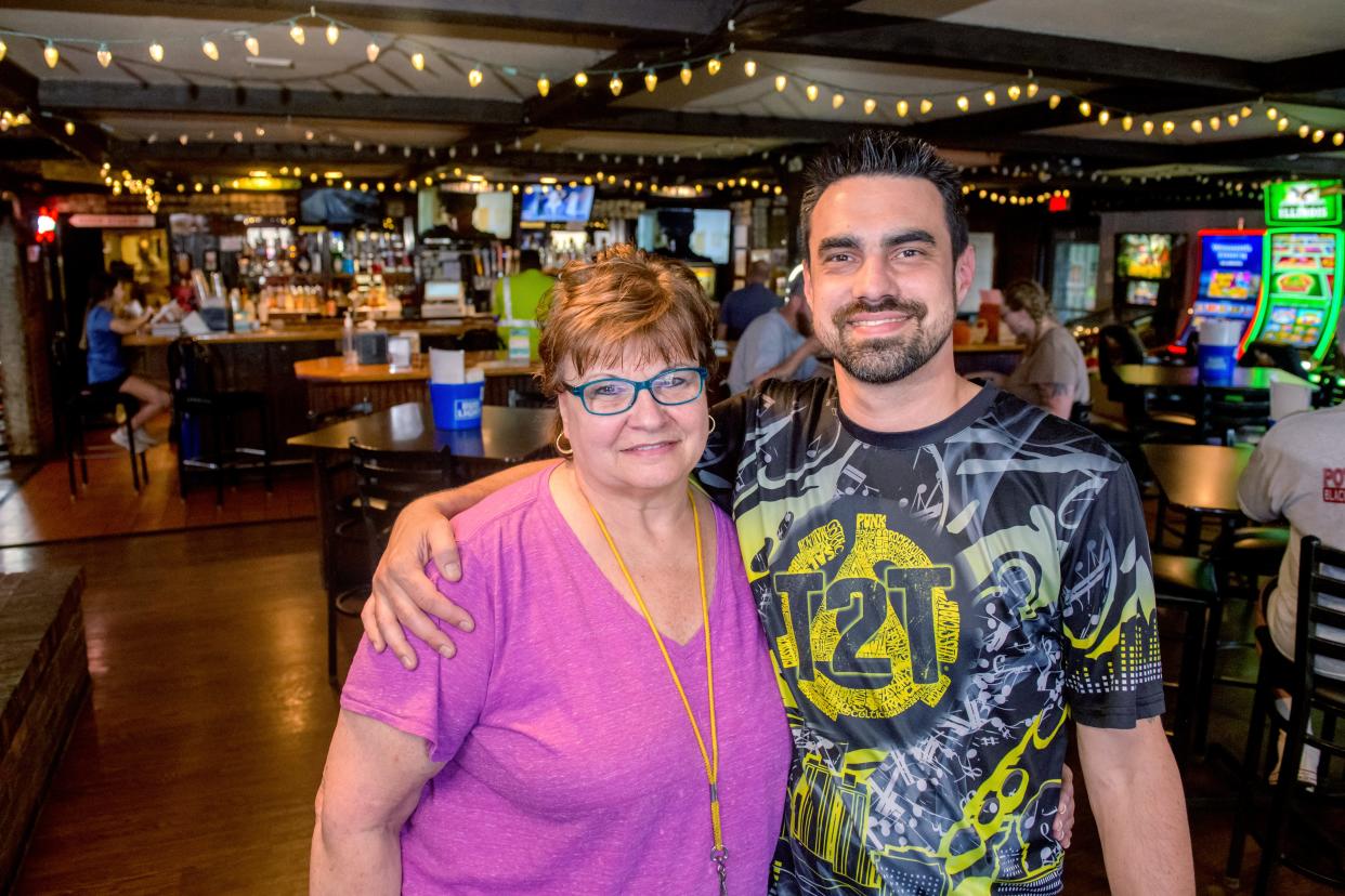 MaryBeth Milburn, left, and her son Dan Gilfillan started MD's Sports Bar and Grill, 7719 N. University Street in Peoria, in 2017.