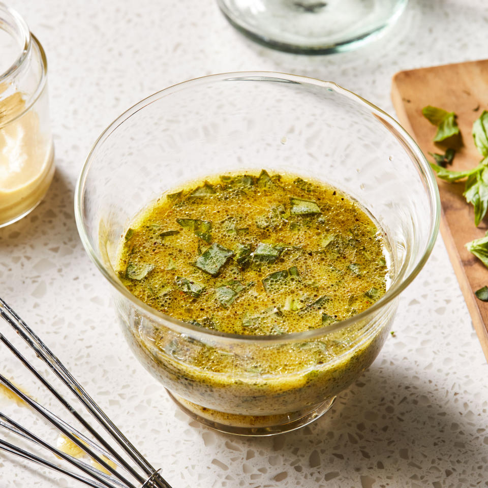 <p>This lemony dressing gets a refreshing herbal lift with chopped fresh basil. Serve it with ripe summer tomatoes for an easy side salad.</p>