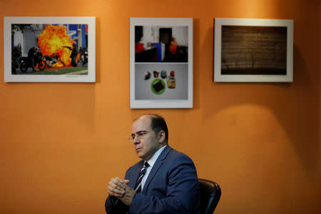 Venezuelan economist Francisco Rodriguez, economic advisor of the Venezuelan presidential candidate Henri Falcon, pauses during an interview with Reuters in Caracas, Venezuela March 12, 2018. Picture taken March 12, 2018. REUTERS/Carlos Garcia Rawlins