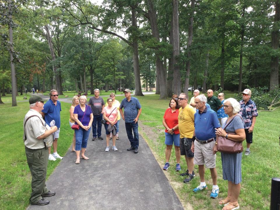 John Havens, building and grounds superintendent at the Hayes Presidential Library and Museums, leads tree tours from April through September.