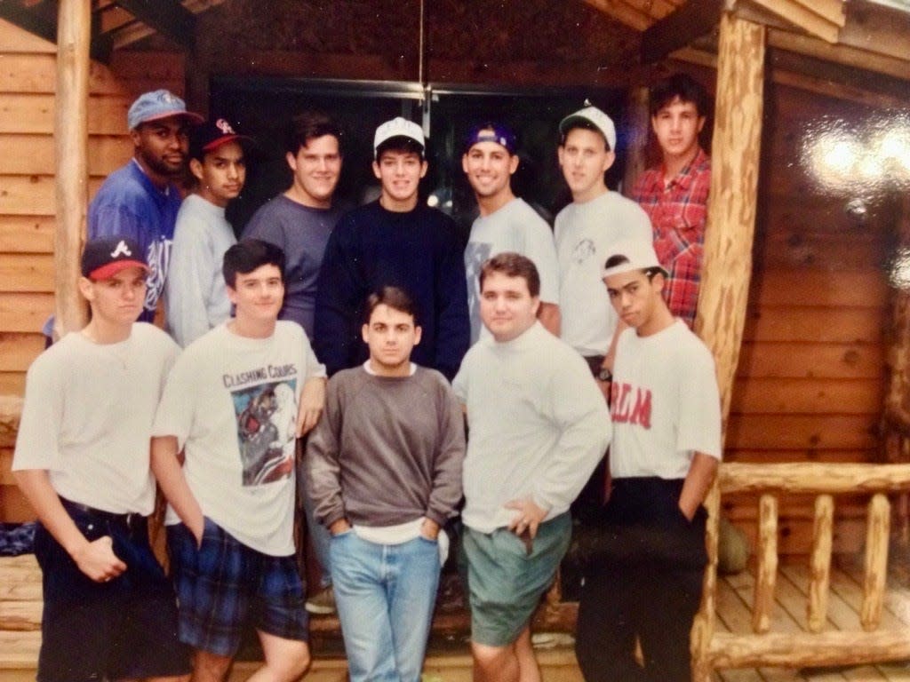 Florida State University Phi Gamma Delta fraternity brothers including 1994 murder victim John Edwards,18, bottom far left, and Chris Spires, white hat, top middle. The photo was taken in the fall of 1993.