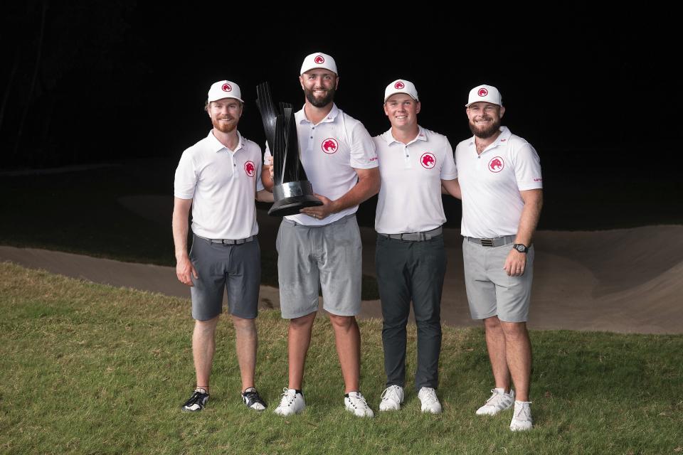 From left to right, Kieran Vincent, captain Jon Rahm, Caleb Surratt and Tyrrell Hatton, of Legion XIII GC, first-place team champions, celebrate with the trophy after the final round of LIV Golf Mayakoba at El Camaleón Golf Course, Sunday, Feb. 4, 2024, in Playa del Carmen, Mexico. (Montana Pritchard/LIV Golf via AP)