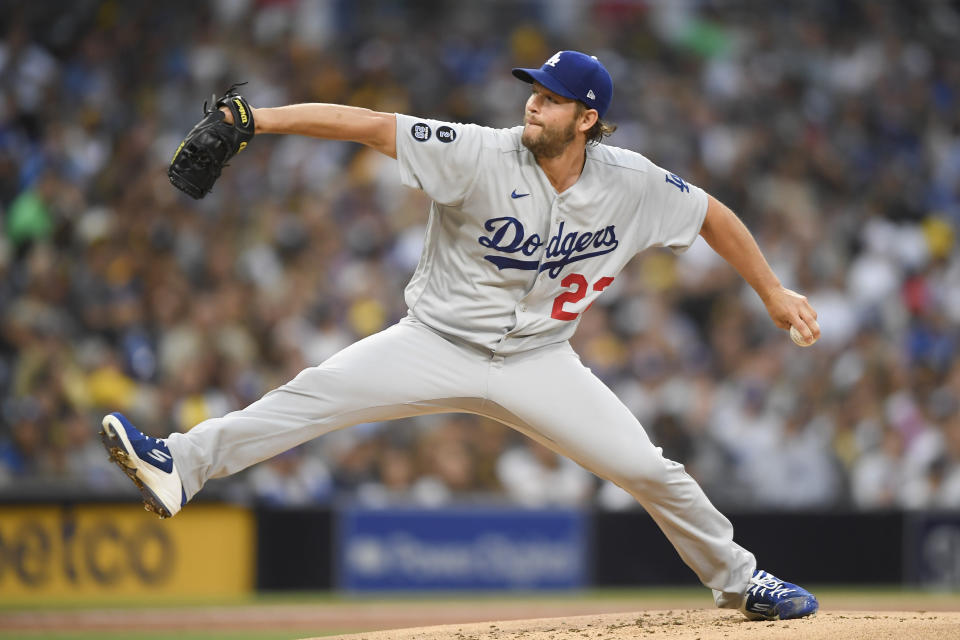 Los Angeles Dodgers starting pitcher Clayton Kershaw (22) delivers during the first inning of a baseball game against San Diego Padres Tuesday, June 22, 2021, in San Diego. (AP Photo/Denis Poroy)