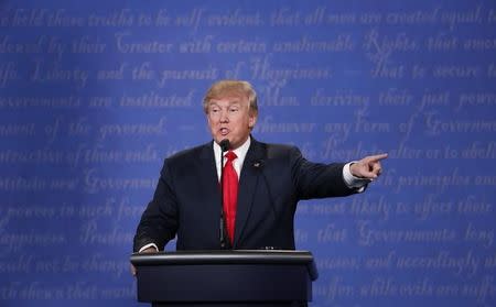 Republican U.S. presidential nominee Donald Trump speaks during the third and final debate with Democratic nominee Hillary Clinton (not pictured) at UNLV in Las Vegas, Nevada, U.S., October 19, 2016. REUTERS/Rick Wilking