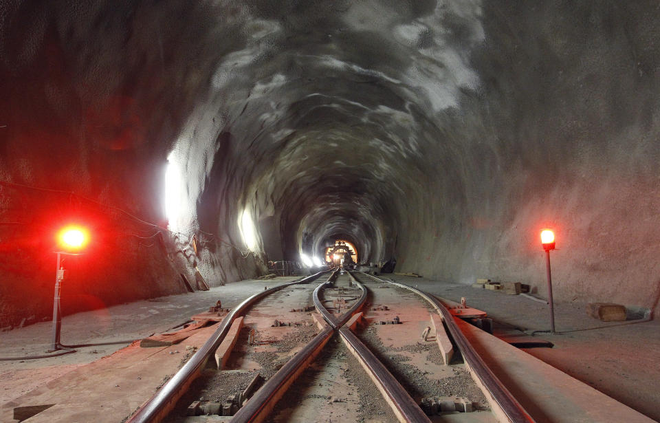 Red lights illuminate the construction site of the of the NEAT Gotthard Base Tunnel at the Erstfeld-Amsteg section