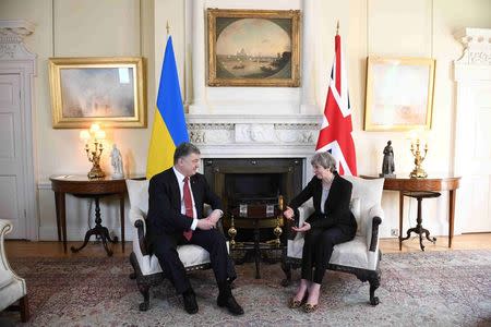 Britain's Prime Minister Theresa May hosts Ukrainian President Petro Poroshenko in 10 Downing Street, in central London, Britain April 19, 2017. REUTERS/Stefan Rousseau/Pool
