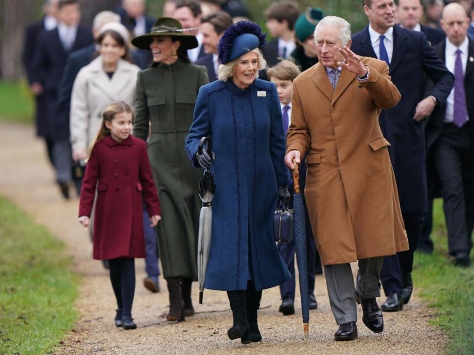 King Charles waves as the royal family attends church at Sandringham on Christmas Day in 2022