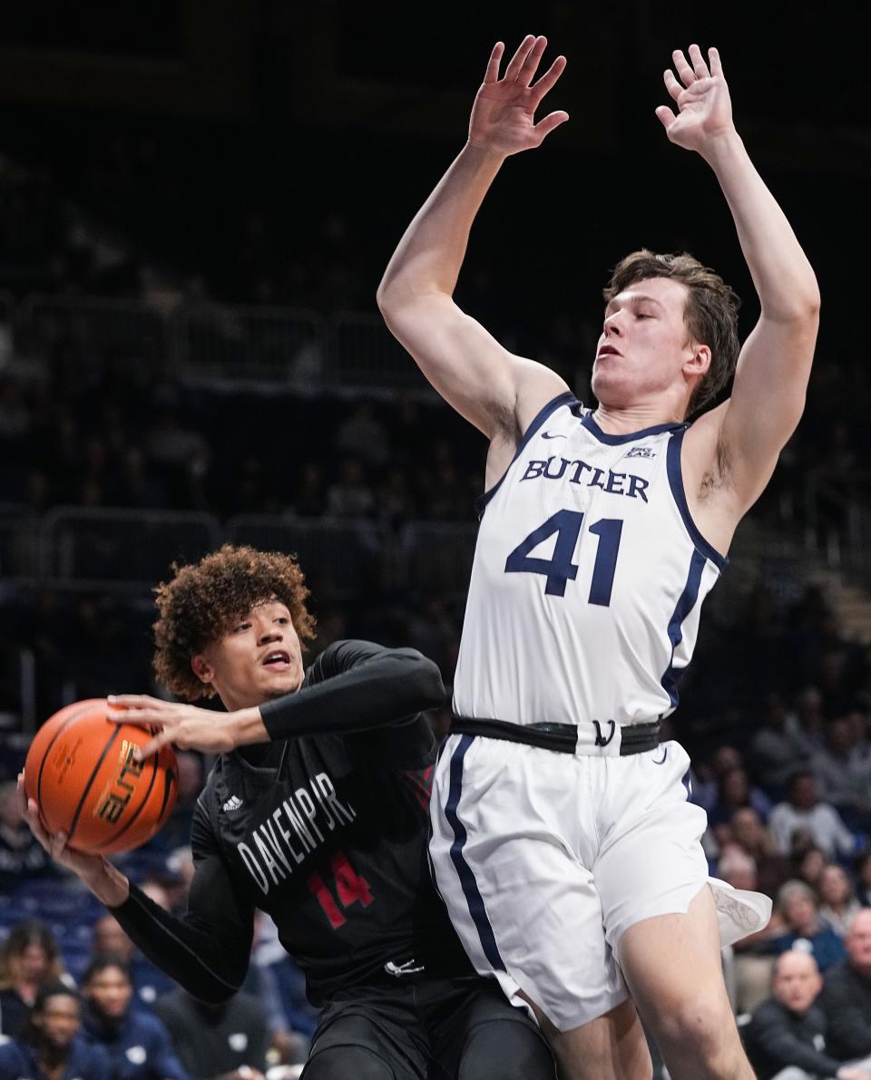 Butler Bulldogs guard Simas Lukosius (41) blocks Davenport Panthers Chaz Birchfield (14) on Tuesday, Nov. 1, 2022, at Hinkle Fieldhouse in Indianapolis. The Butler Bulldogs lead at the half agains the Davenport Panthers. 