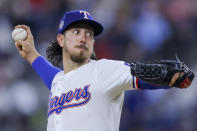 Texas Rangers pitcher Michael Lorenzen delivers during the sixth inning of a baseball game against the Cincinnati Reds in Arlington, Texas, Saturday, April 27, 2024. (AP Photo/Gareth Patterson)