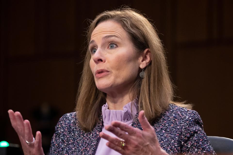 Supreme Court nominee Amy Coney Barrett testifies before the Senate Judiciary Committee on the third day of her confirmation hearing on Capitol Hill on Oct. 14.